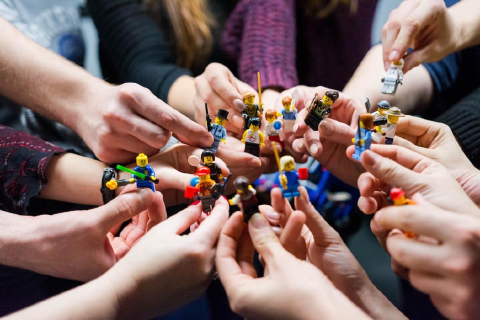 Lego characters coming together